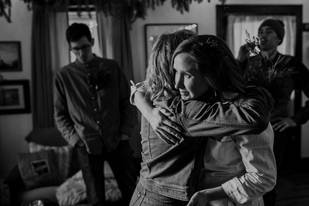 A bride hugs one of her dearest friends on her elopement day