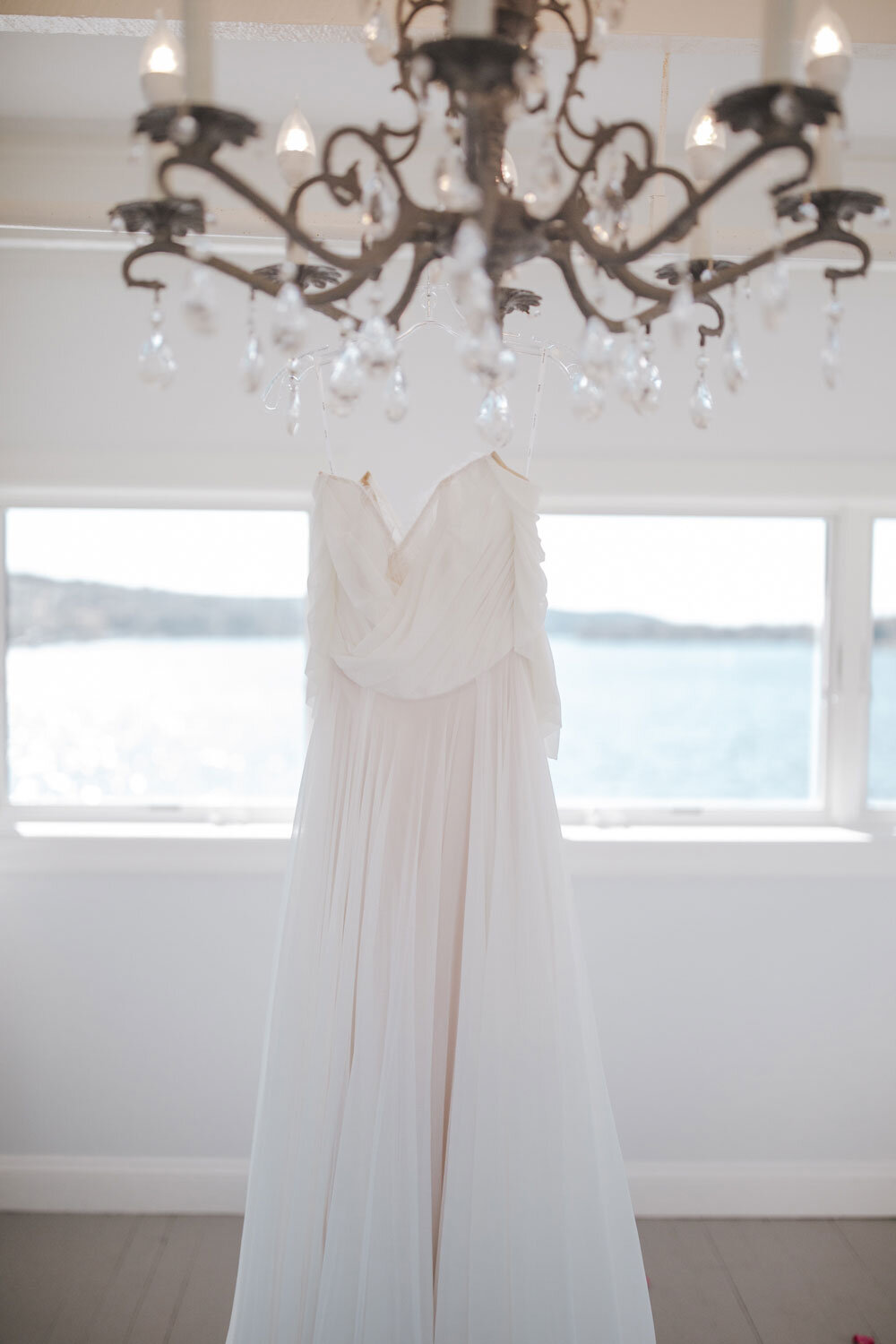 a brides dress hanging