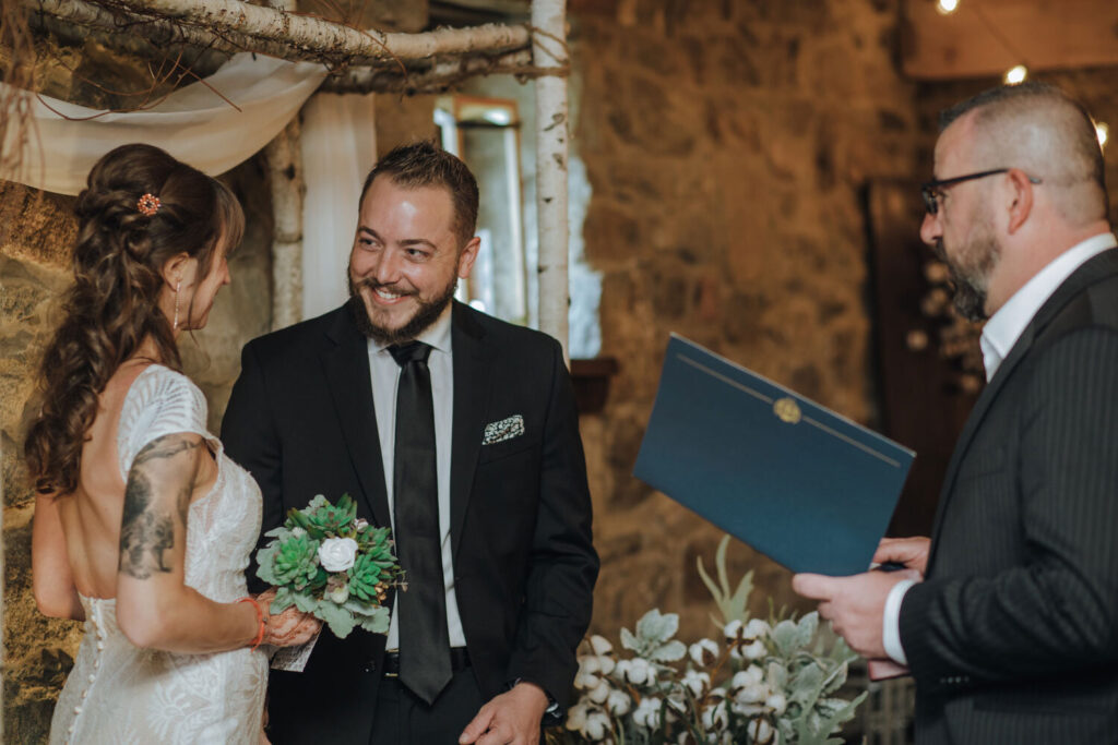 Bride and Groom exchange vows during their brunch wedding