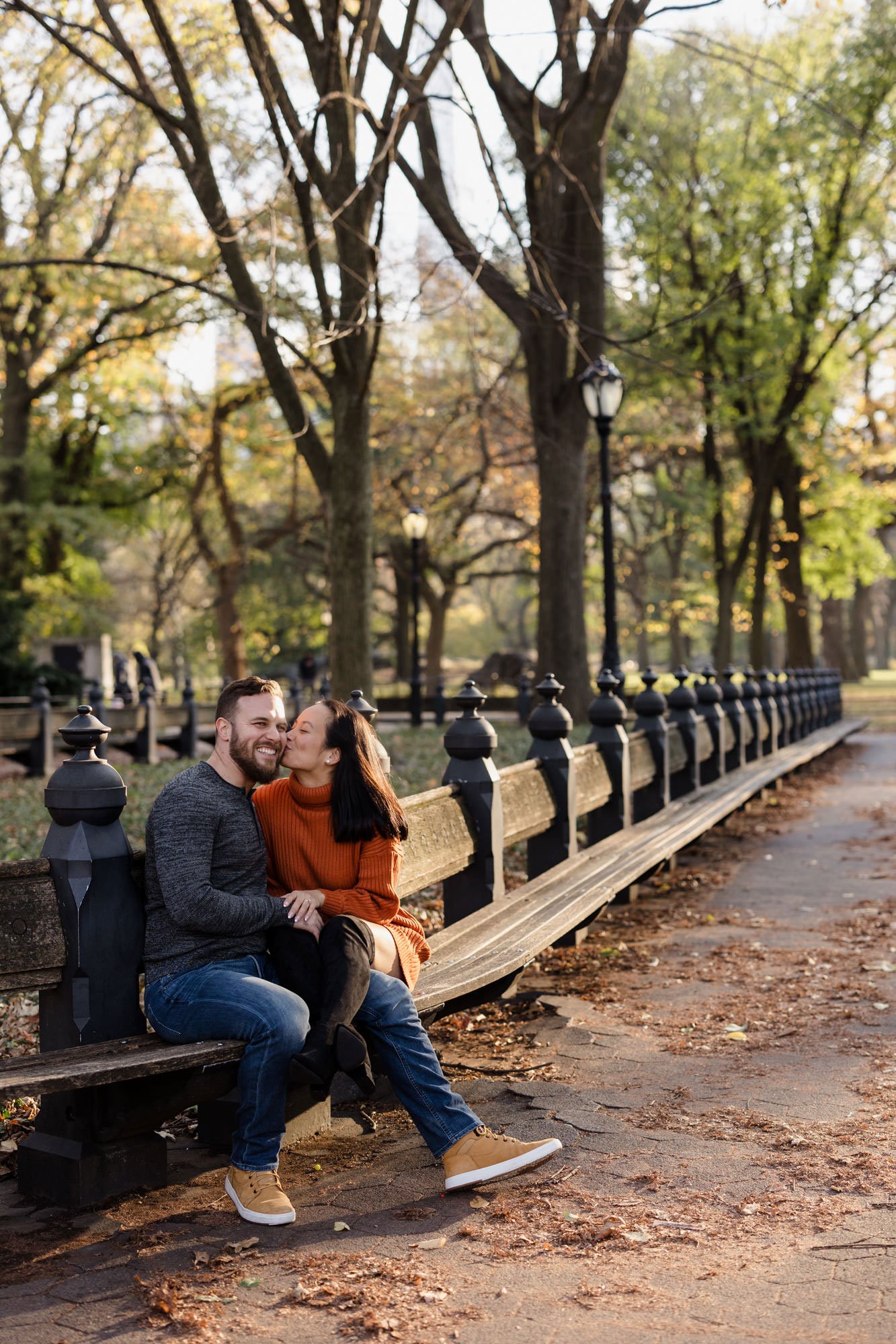 a couple being photographed at the mall at Central Park, New York City