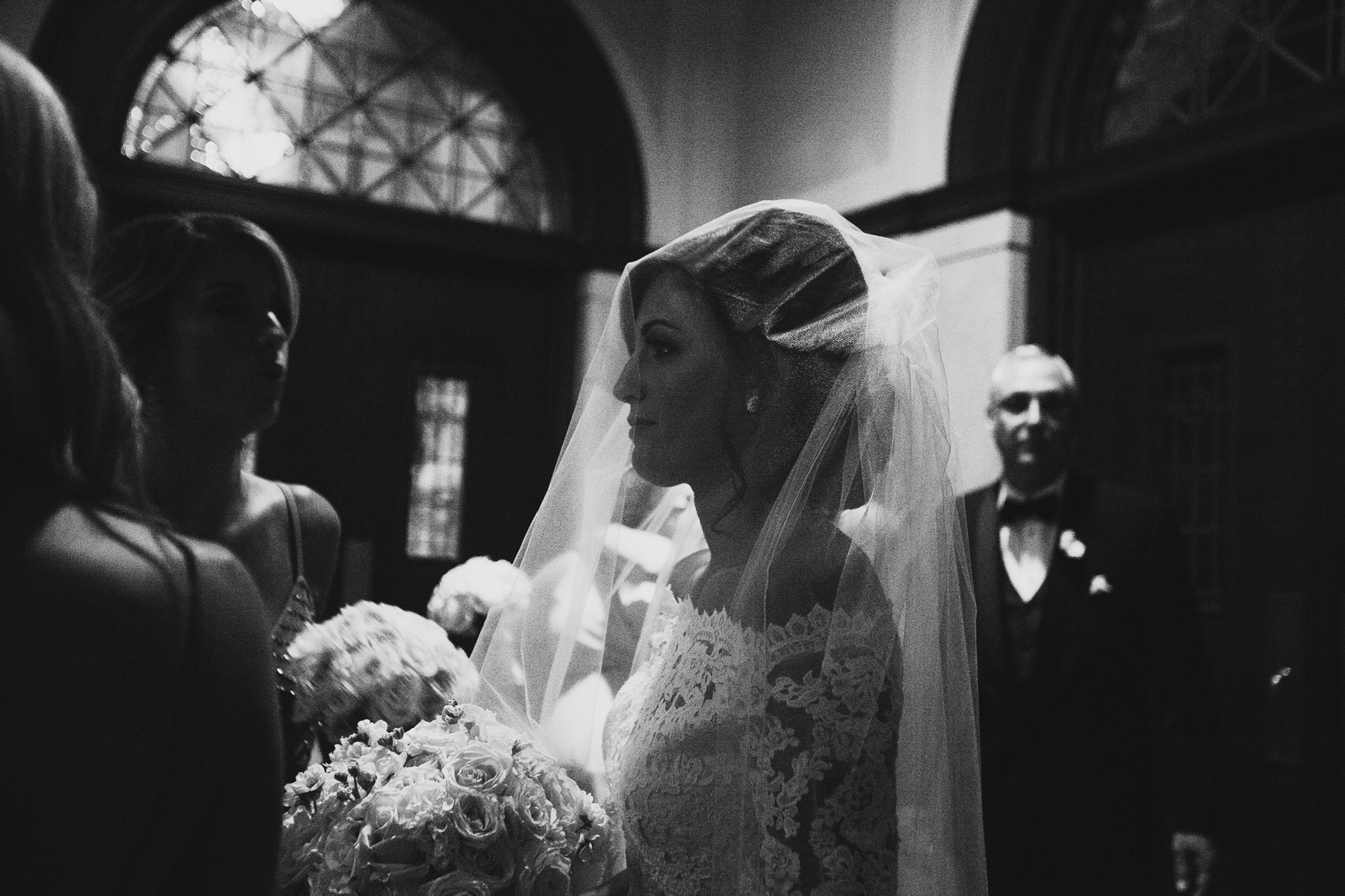 emotional bride waiting to walk down the aisle