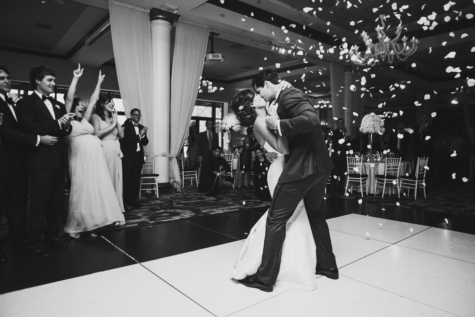confetti being shot across the dance floor as the couple is announced