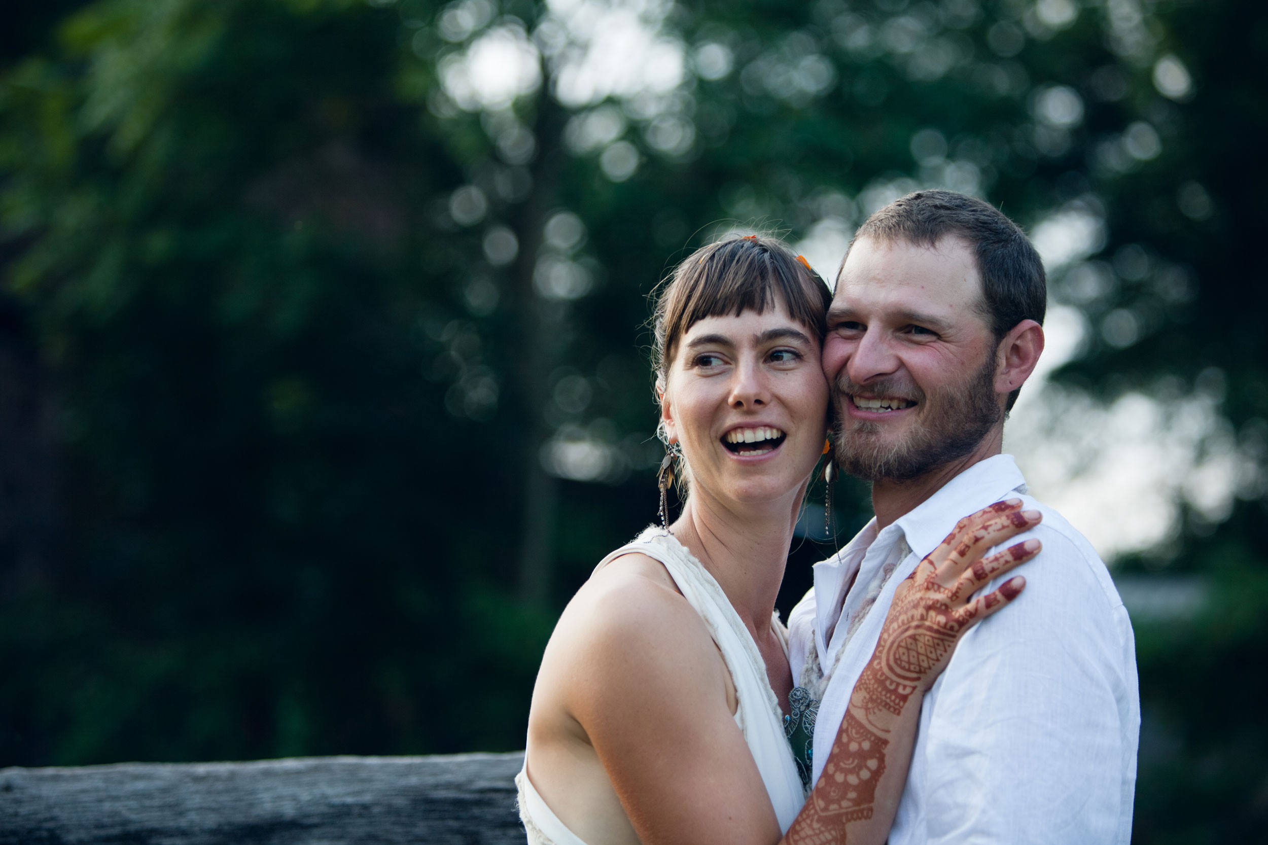 a portrait of a bride and groom on their farm in Central Pa