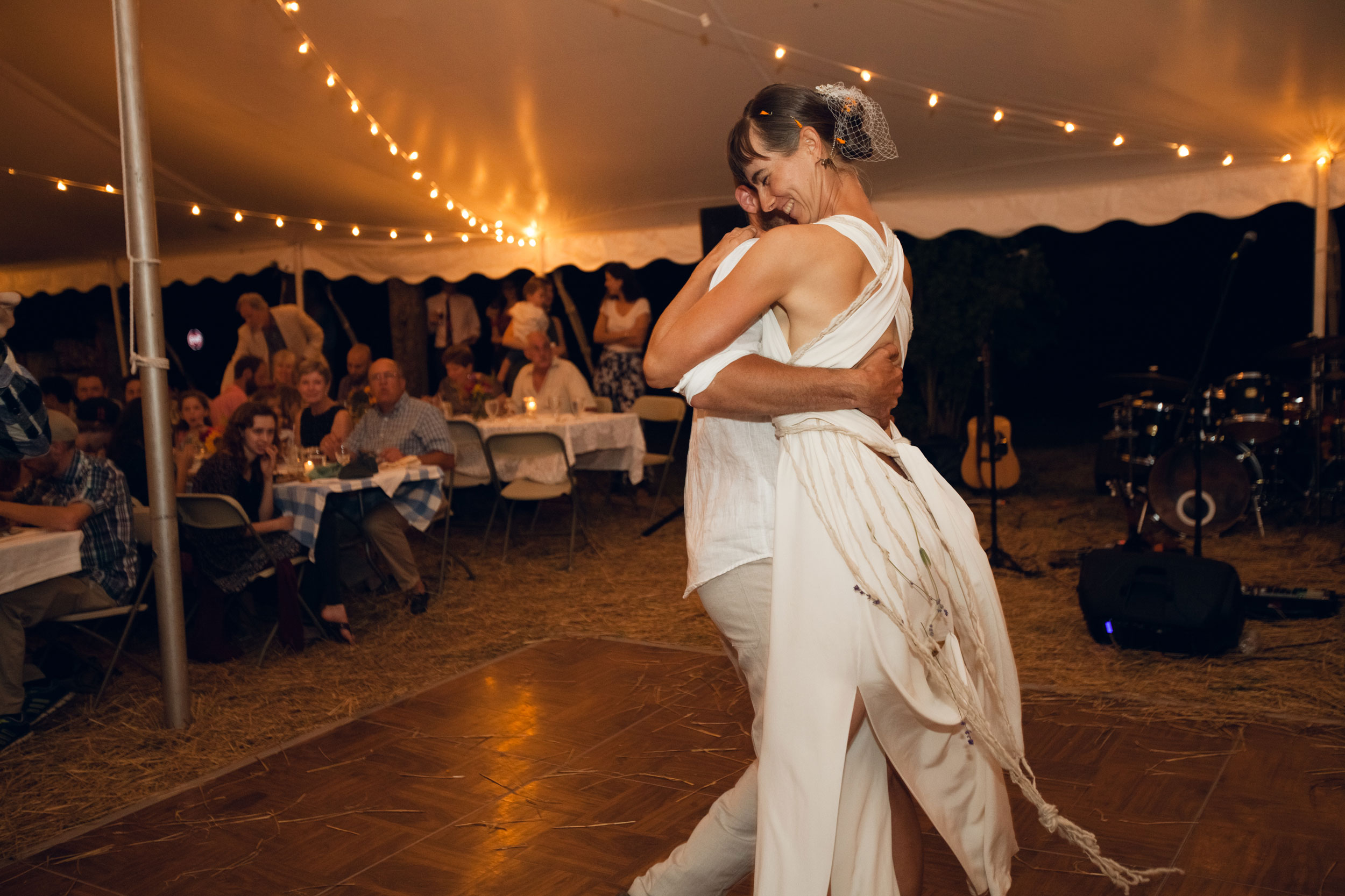 A couple embracing during the first dance at their wedding