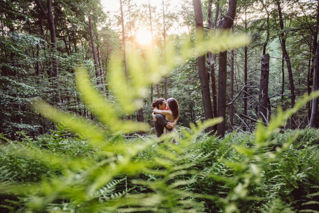couple embracing in the forest at shenandoah