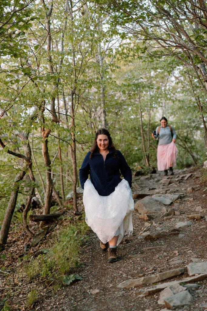The bride hiking up to Stony Man before sunrise on her elopement day.