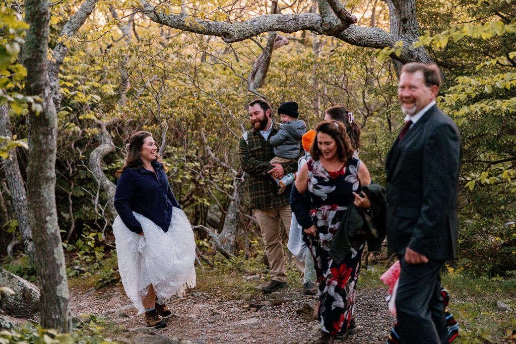 A bride talking with her family before the start of her elopement ceremony. 