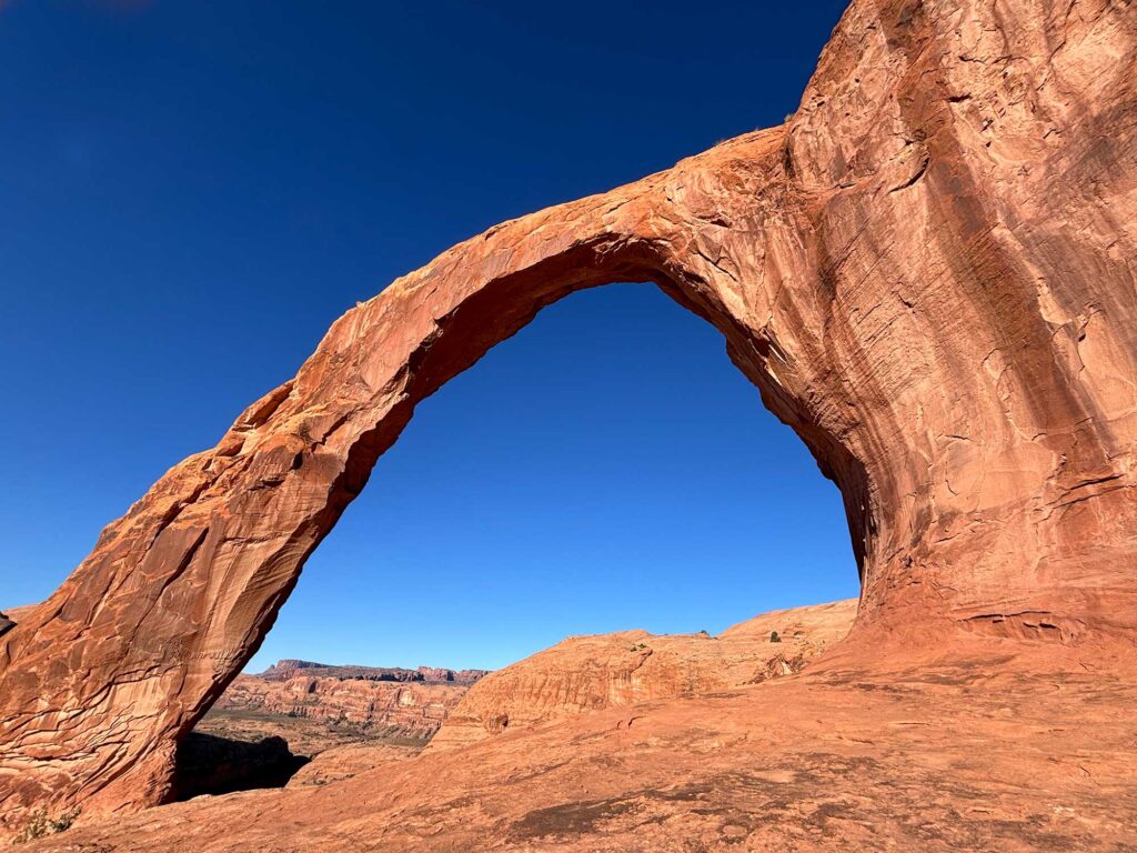 A photo of Corona Arch in Utah, which is a perfect spot to elope.