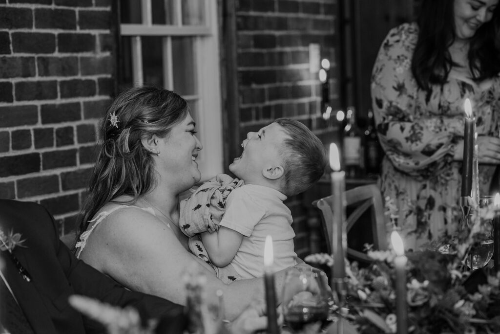 The birds and her nephew. Her bride is cracking up laughing.