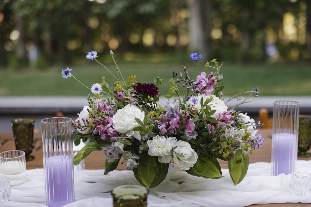 Flowers on a table set for an intimate dinner at indigo house in Virginia